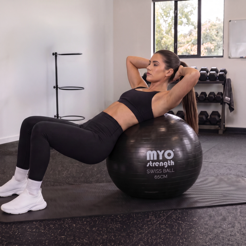 MYO Strength Swiss Ball 65cm used for core training in a gym